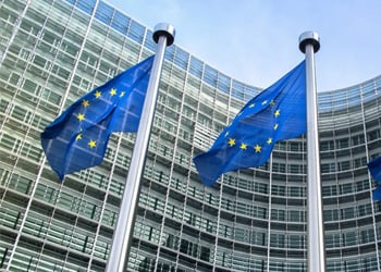 European Union flags outside building